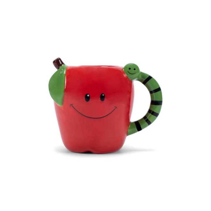 A cheerful red apple-shaped mug with a smiling face and a cute green worm wrapped around the handle. The worm has a happy expression, and the mug gives a playful, teacher-themed vibe.