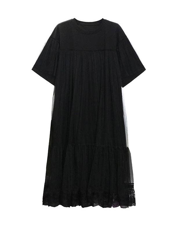 A black gauzy A-line dress with an edgy design, featuring a flowy silhouette and lightweight fabric, perfect for making a bold statement with a touch of elegance.