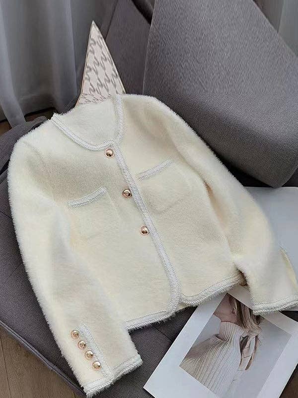 Cozy, ladylike long sleeve white cardigan with gold button accents, perfect for layering in any season, offering both elegance and warmth.