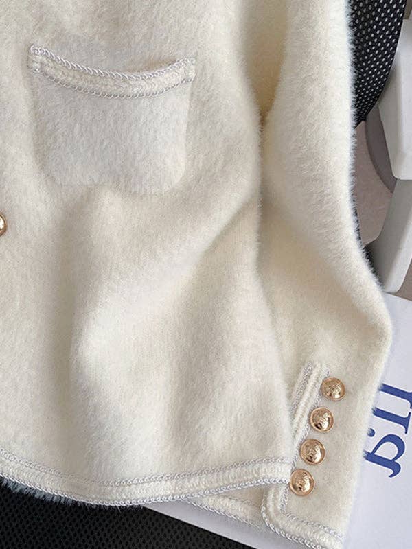 Closeup of Sleeve of Cozy, ladylike long sleeve white cardigan with gold button accents, perfect for layering in any season, offering both elegance and warmth.
