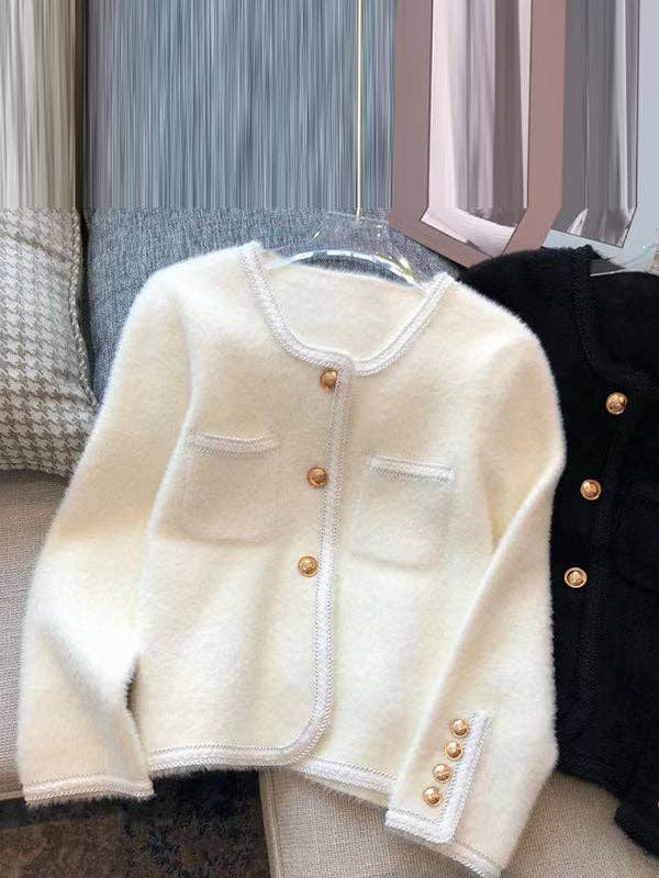 Cozy, ladylike long sleeve white cardigan with gold button accents, perfect for layering in any season, offering both elegance and warmth.