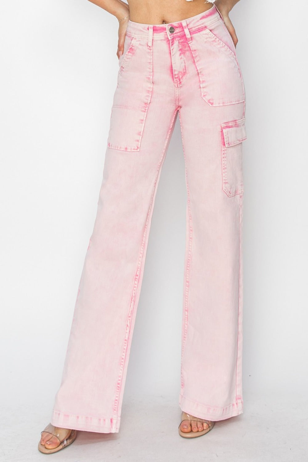 Close up front view High-rise cargo pocket jeans with a slightly stretchy fit, featuring a flattering waistline and functional pockets, perfect for a trendy and casual everyday look.