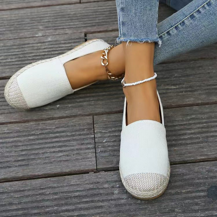 Round Toe Flat Slip-Ons in white, showcasing a clean and simple design perfect for casual outfits.