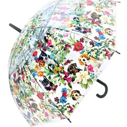 Side view of open transparent umbrella with vibrant flowers and puppies.