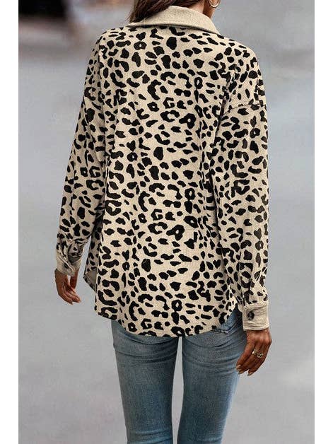 A back view of a beige leopard print jacket, showcasing its loose fit and relaxed style. The jacket is paired with light-wash jeans, giving a casual yet trendy look, ideal for layering during the fall season.